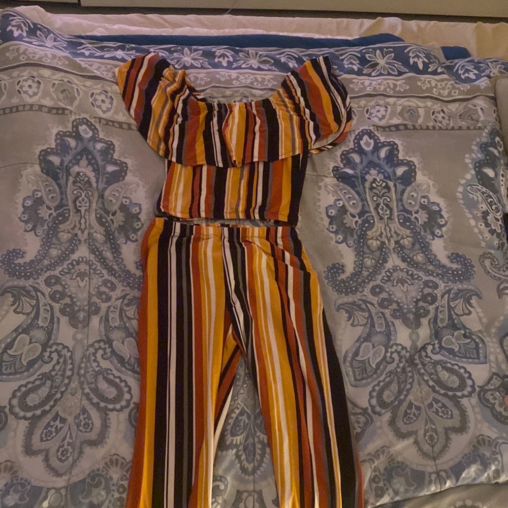 Two pieces. Top and Long Bottoms. Classy. Outwear.